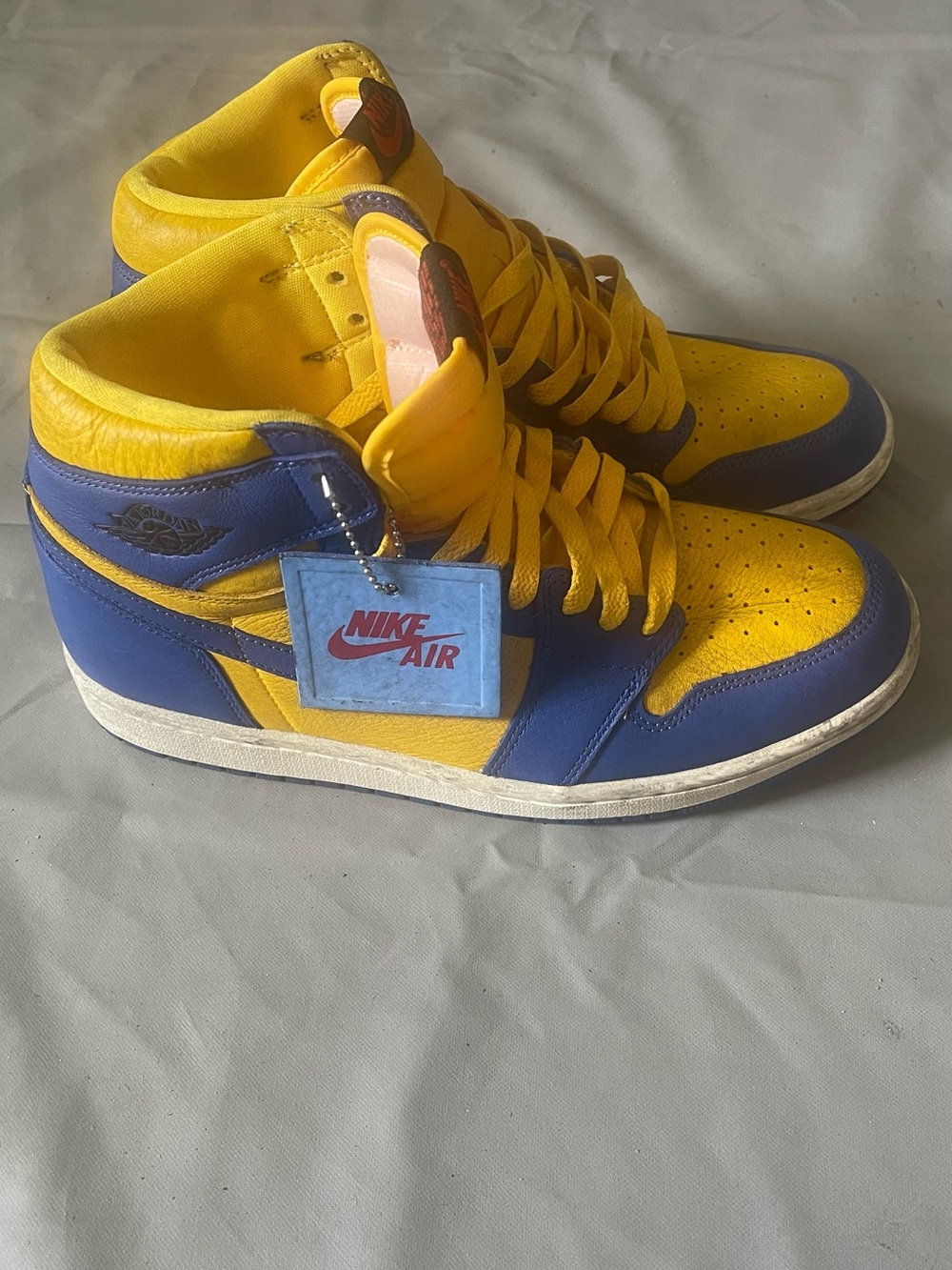 Nike High-Top Sneakers in Yellow and Blue with Red Logo